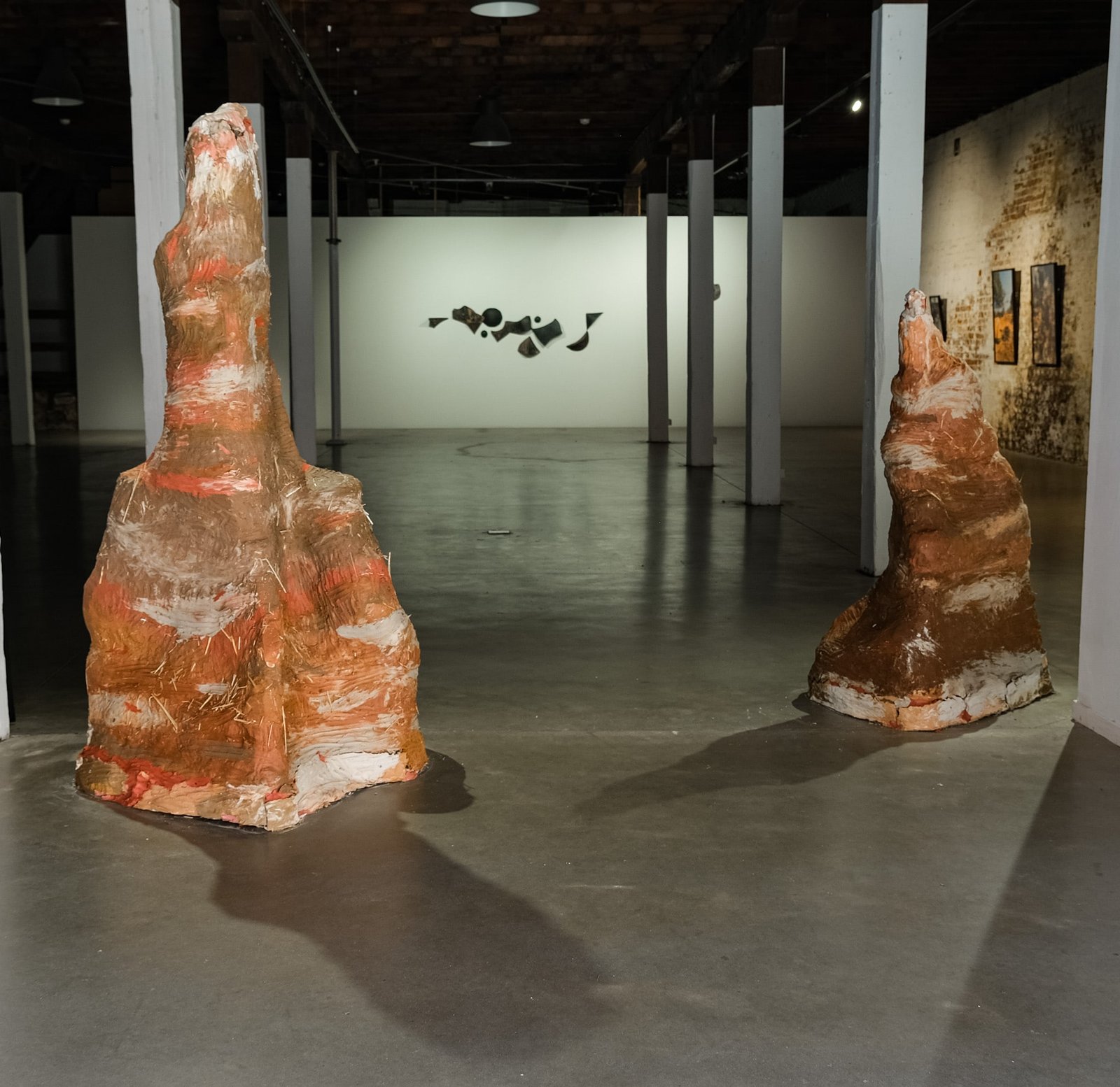 Bedforms. Shupiwe Chongwe, Termite mounds, dimensions variable. PS Art Space, Perth, Australia. Courtesy of Shupiwe Chongwe