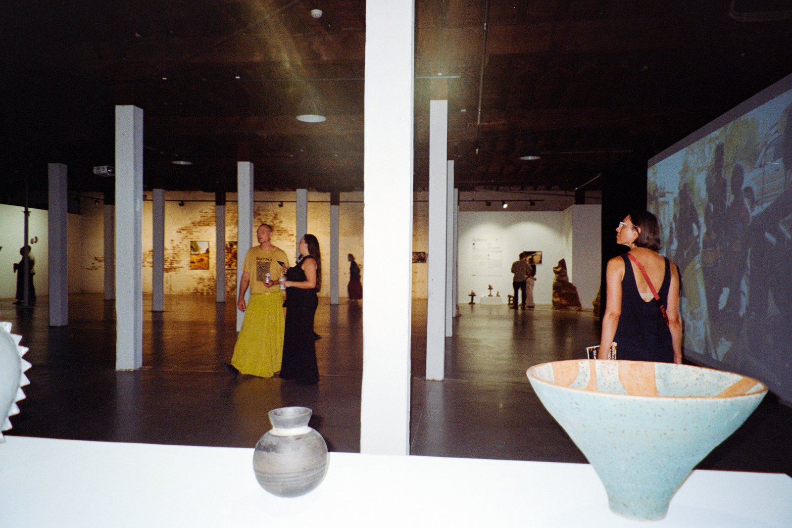 Bedforms. Shupiwe Chongwe, Exhibition hall with visitors. PS Art Space, Perth, Australia. Courtesy of Shupiwe Chongwe